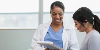 Two female physicians talking